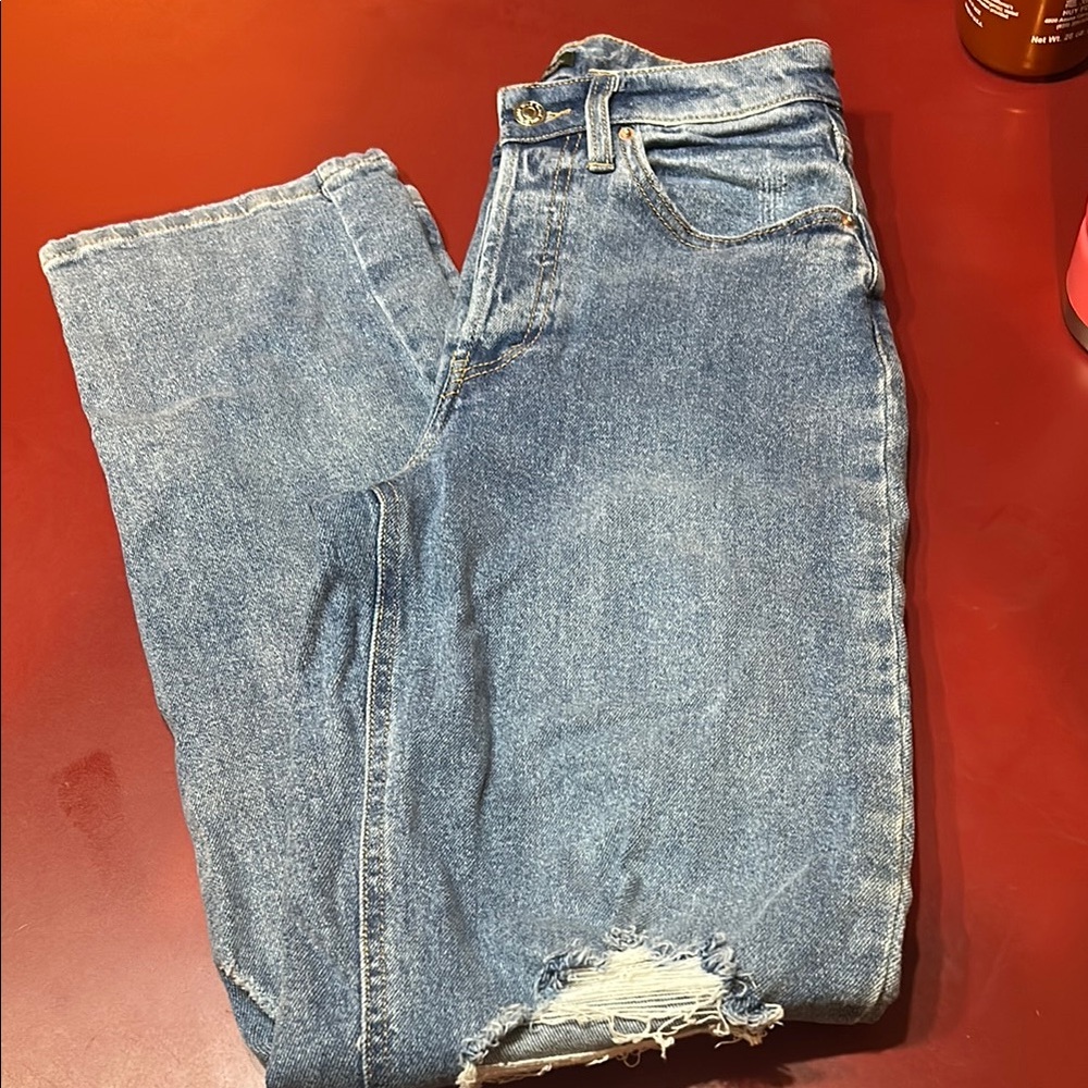 Blue Straight Leg Jeans with Distressed Details